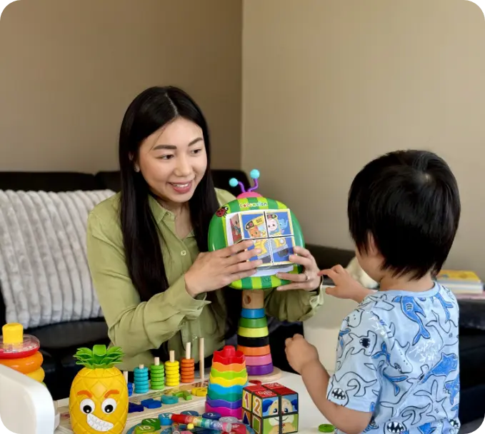 vanessa-holding-toy-giving-to-child
